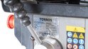 Detail van het typeplaatje 'TORROS DTI16M 400W 230V 32 kg' en waarschuwingssymbolen.