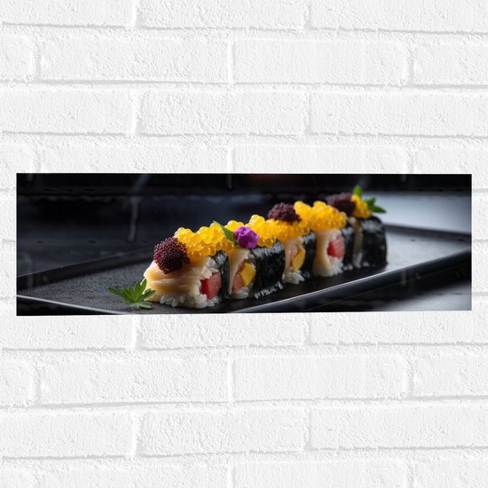 Muursticker - Sushi Rol op Zwart Stenen Plateau - 60x20 cm Foto op Muursticker