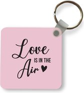 Sleutelhanger - Uitdeelcadeautjes - Quotes - Love is in the air - Spreuken - Plastic