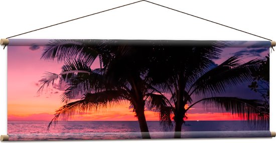 Textielposter - Twee Palmbomen op het Strand langs de Zee bij Zonsondergang - 120x40 cm Foto op Textiel