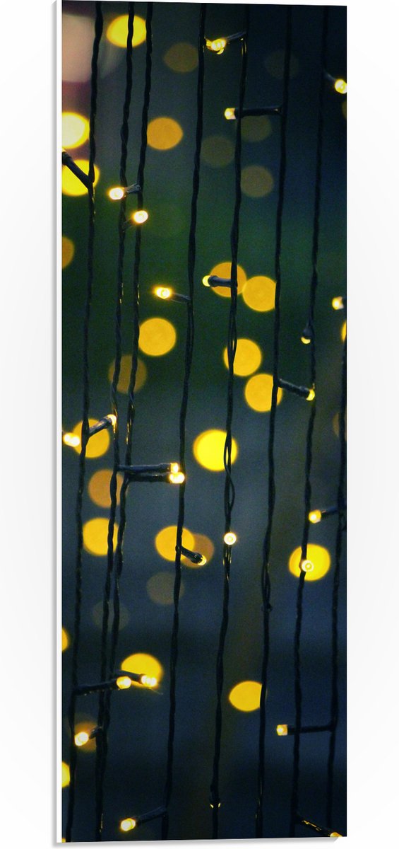 PVC Schuimplaat- Gele Lichtvlekjes aan Zwart Lichtgordijn - 20x60 cm Foto op PVC Schuimpla
