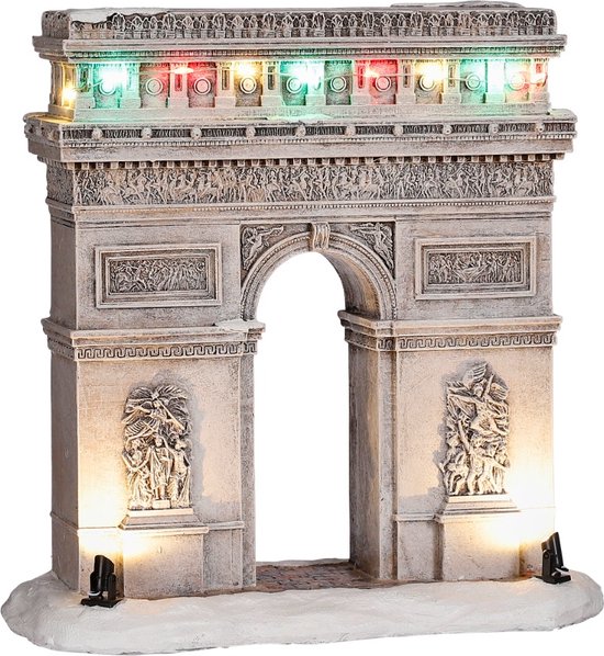 Boog van triomf met verlichting in rode, groene en witte kleuren op een sneeuwbasis.