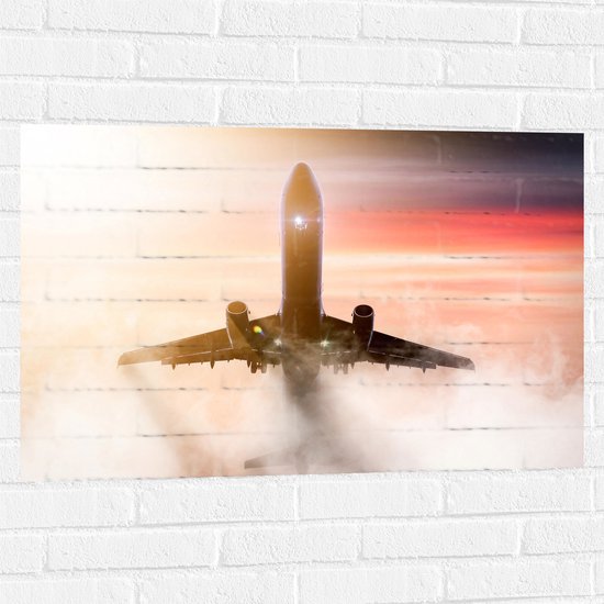 Muursticker - Passagiersvliegtuig bij Zonsondergang door de Wolken - 90x60 cm Foto op Muursticker