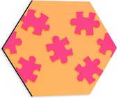 Dibond Hexagon - Roze Puzzelstukjes op Oranje Achtergrond - 30x26.1 cm Foto op Hexagon (Met Ophangsysteem)