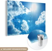 MuchoWow® Glasschilderij 30x20 cm - Schilderij acrylglas - Zon tussen de wolken aan de hemel - Foto op glas - Schilderijen