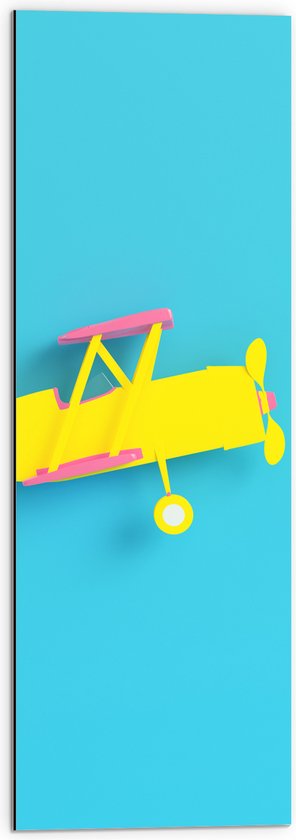 Dibond - Zijaanzicht van Felgeel Zweefvliegtuig met Roze Details tegen Blauwe Achtergrond - 30x90 cm Foto op Aluminium (Wanddecoratie van metaal)