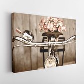 Old bicycle and flowers blur in background process in vintage old style film. Classic design bike with wood wall out focus behind - Modern Art Canvas - Horizontal - 93873286 - 115*