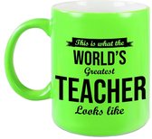 Worlds Greatest Teacher cadeau koffiemok / theebeker voor leraar / lerares neon groen 330 ml