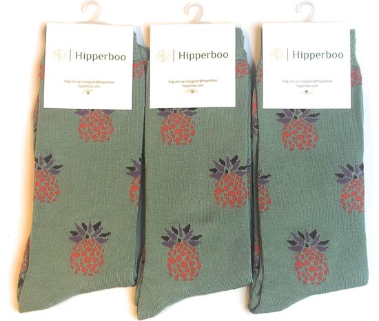 Drie paar mintgroene Hipperboo sokken met rode ananasprint.