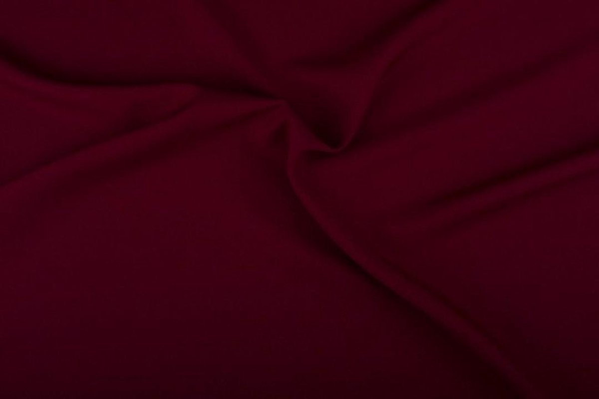 Afbeelding van product Texture/Polyester stof - Bordeaux rood - 50 meter