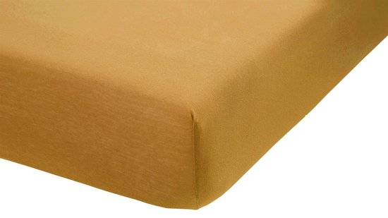 Okergeel jersey split-topper hoeslaken, detail van de hoek.