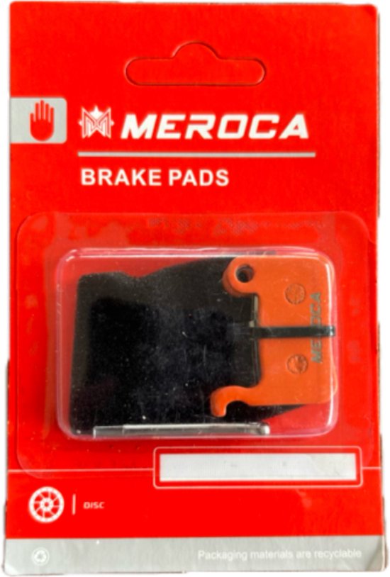 Verpakking met oranje remblokken van "MEROCA", met de tekst "BRAKE PADS".