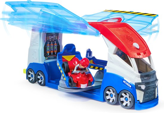 PAW Patrol Patroller met geopende vleugels, Ryder op een rode ATV, en een blauw en rood voertuig met wielen.