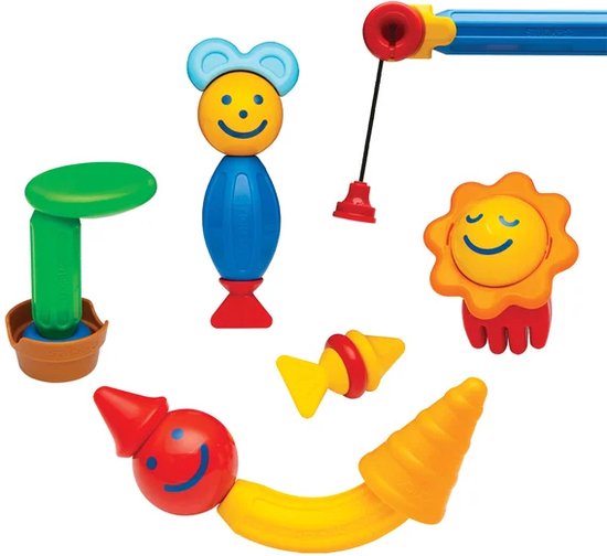 Verschillende magnetische bouwwerken: een bloem, een poppetje met oren, een vliegende schotel, een plantje en een worm.