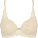 Soutien-gorge nude à armatures avec une texture chevrons et des bords décorés.