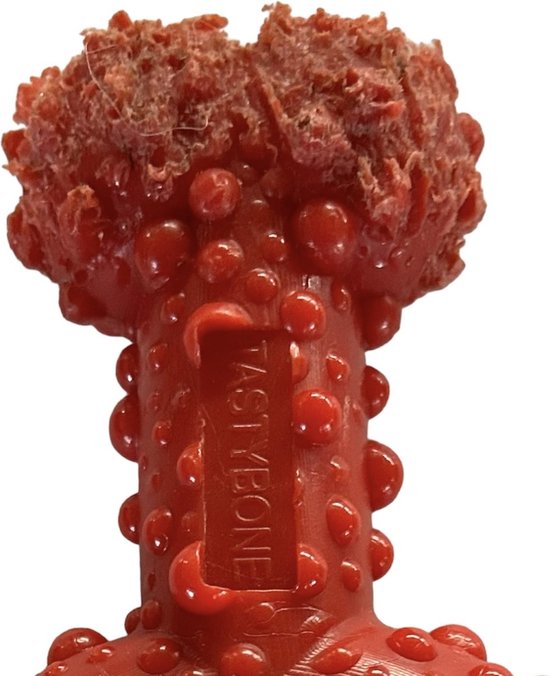 Rode TastyBone kluif met noppen textuur en een stukje stof aan de bovenkant.