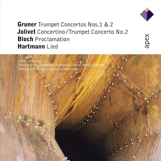 Albumhoes met "Gruner Trumpet Concertos Nos. 1 & 2 Jolivet Concertino/Trumpet Concerto No.2 Bloch Proclamation Hartmann Lied" en een detail van een roestige, metalen tunnel.
