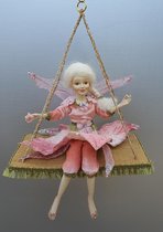 Fairytale women in swing 21x11x33cm