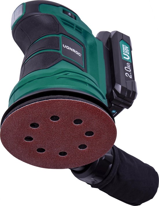 Onderkant van een groene Vonroc excentrische schuurmachine met schuurpapier en stofzak.