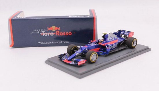 Modelauto Toro Rosso STR12 'Australië GP 2017' naast de verpakking met logo en website.