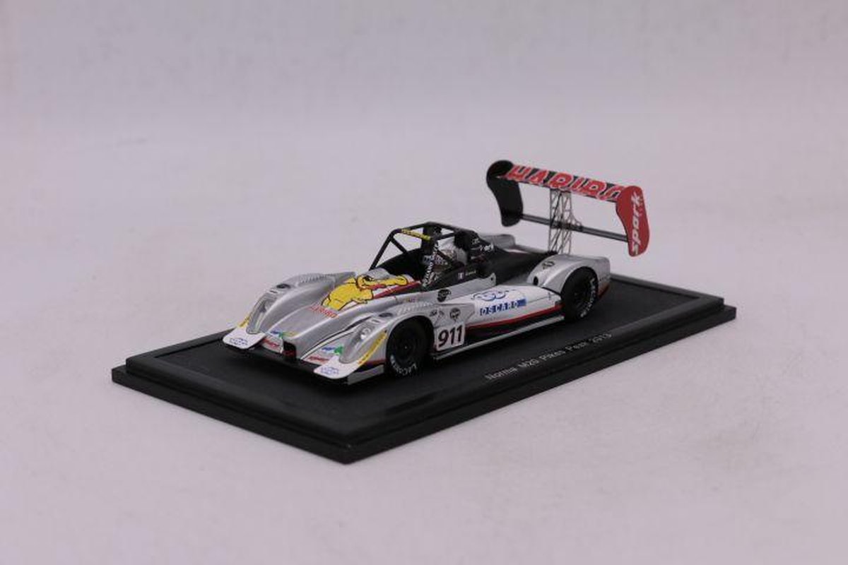 The 1:43 Diecast Modelcar of the Norma M20 #911 of Pikes Peak 2013. The driver was Romain Dumais. The manufacturer of this scalemodel is Spark.