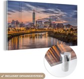 MuchoWow® Glasschilderij 120x60 cm - Schilderij acrylglas - Zonsondergang bij Taipei 101 in Taiwan met weerspiegeling in het water - Foto op glas - Schilderijen