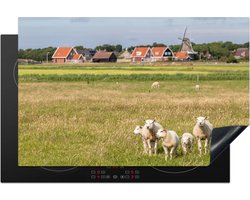 KitchenYeah® Inductie beschermer 81.6x52.7 cm - Schapen en een molen op Ameland - Kookplaataccessoires - Afdekplaat voor kookplaat - Inductiebeschermer - Inductiemat - Inductieplaat mat