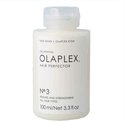 Witte fles Olaplex Hair Perfector No.3 met fliptopdop. Tekst op de fles: 'TAKE HOME OLAPLEX.COM THE ORIGINAL OLAPLEX HAIR PERFECTOR N°.3 REPAIRS AND STRENGTHENS ALL HAIR TYPES'.