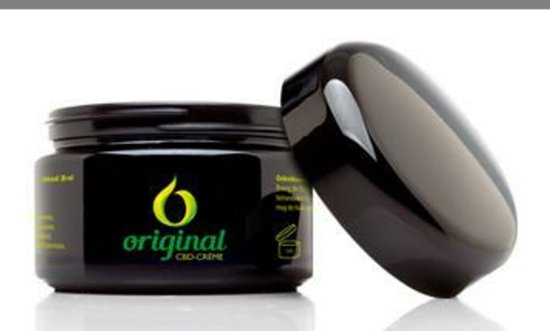 Zwarte pot Original CBD Crème met een open glanzende deksel. De pot heeft een logo met 'original CBD-CRÈME'.