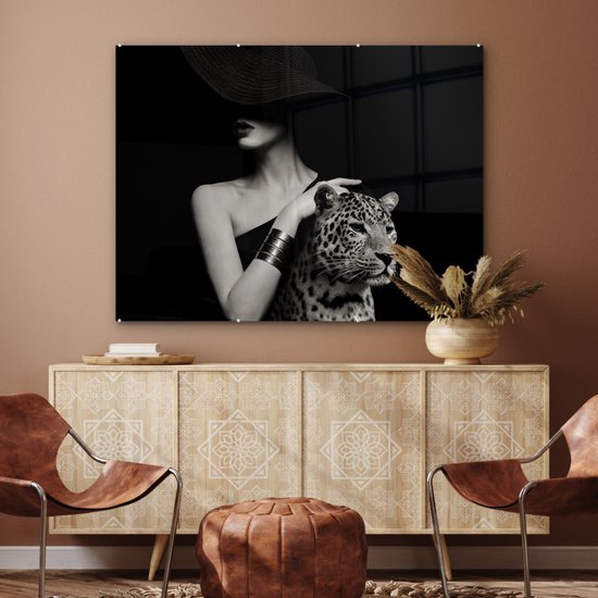 MuchoWow® Glasschilderij 120x90 cm - Schilderij acrylglas - Vrouw - Luipaard - Luxe - Zwart - Wit - Dier - Foto op glas - Muurdecoratie woonkamer - Wanddecoratie slaapkamer - Schilderijen