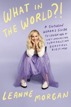 Leanne Morgan zit op een stoel met een paarse tule rok aan. De tekst 'WHAT IN THE WORLD?!' en 'LEANNE MORGAN' staat op de omslag.
