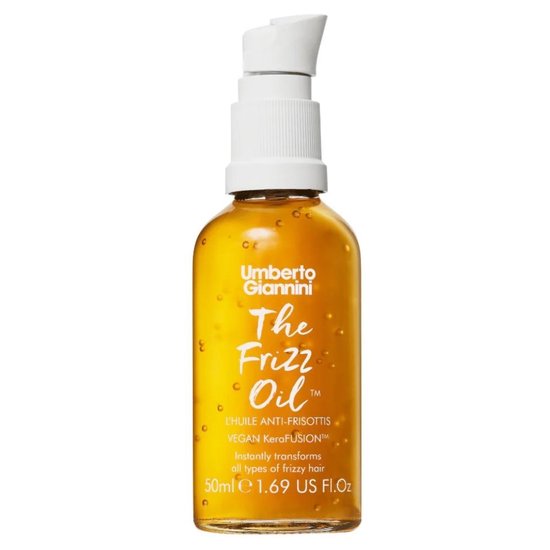 Gouden flesje Umberto Giannini The Frizz Oil met pompje. Bevat 50 ml.