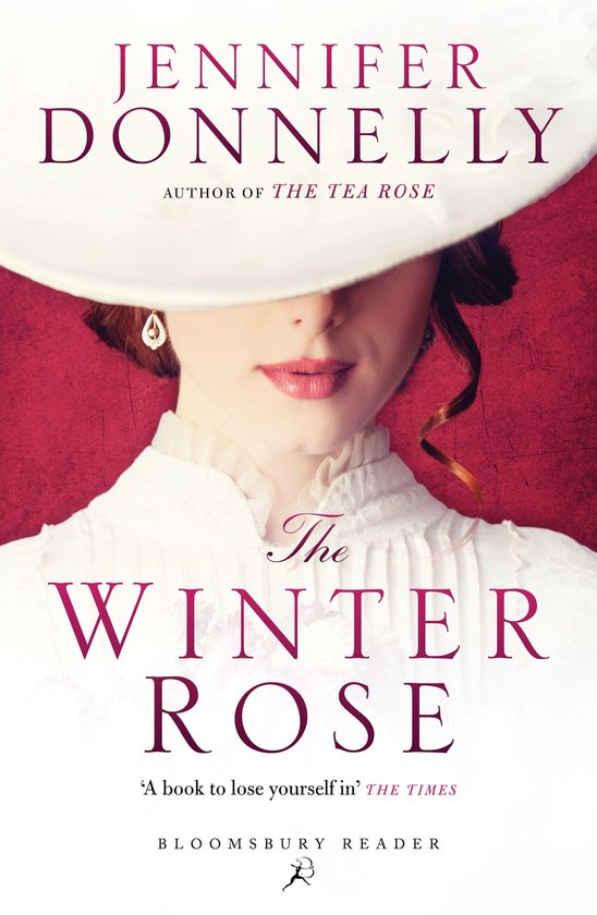 Boekomslag van 'The Winter Rose' door Jennifer Donnelly, met een vrouw in een witte hoed en jurk.