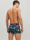 Achterkant van donkerblauwe Jack & Jones boxershorts met tropische bloemenprint en rode merknaam op de band.