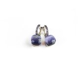 Zilveren oorringen oorbellen model pomellato gezet met grijs blauwe steen