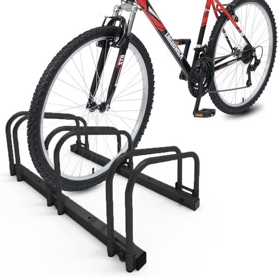 Zwart fietsenrek met drie gebogen steunen, naast een mountainbike.