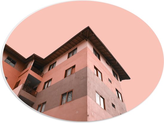 WallClassics - PVC Schuimplaat Ovaal - Gekleurd Appartement met Roze lucht - 40x30 cm Foto op Ovaal (Met Ophangsysteem)
