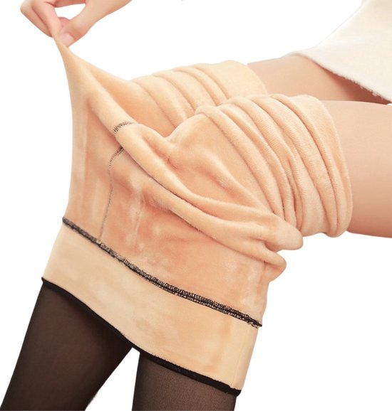 Close-up van een zwarte panty met dikke beige fleece voering aan de binnenkant.