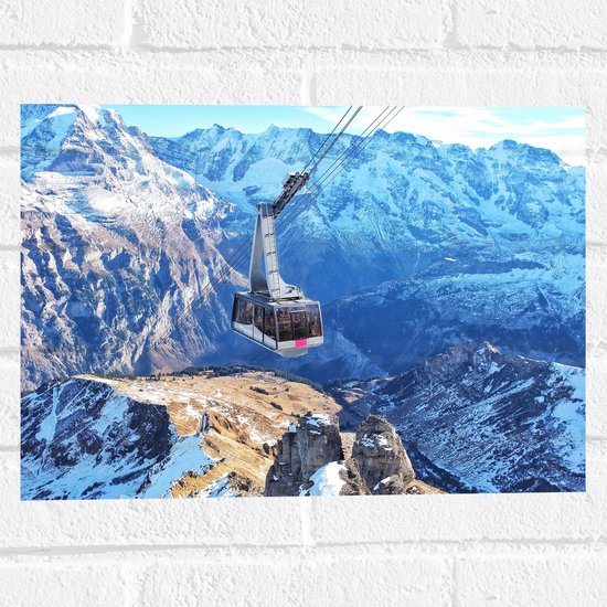 WallClassics - Muursticker - Grote Lift door Zwitserse Alpen - 40x30 cm Foto op Muursticker