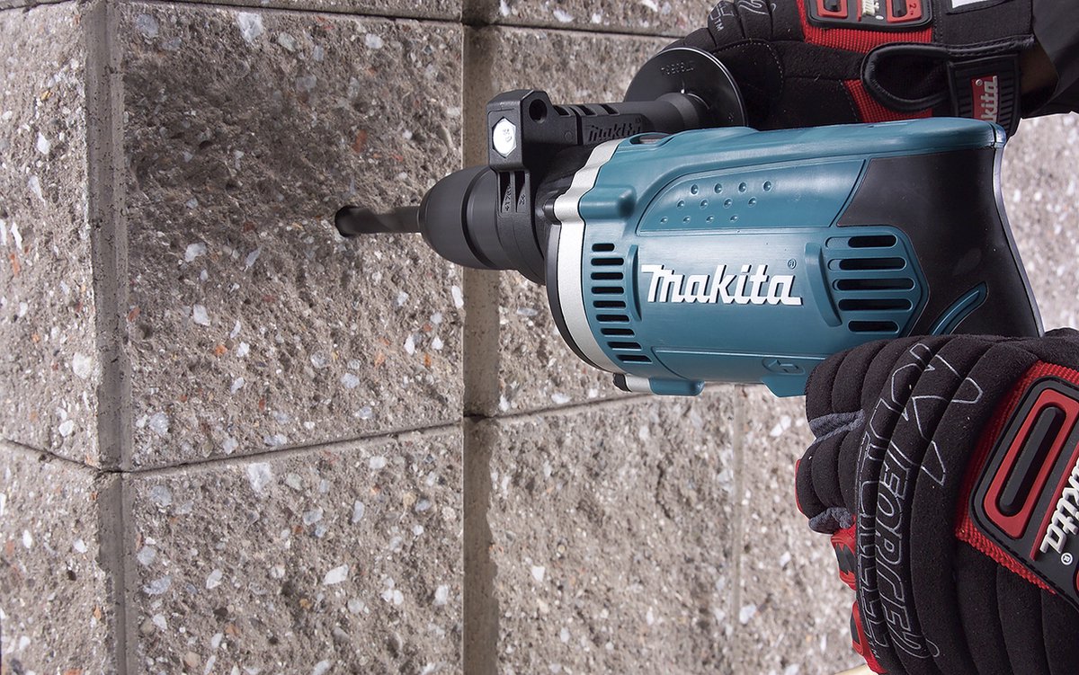 Klopboormachine 710 Watt 13mm in koffer + borenset