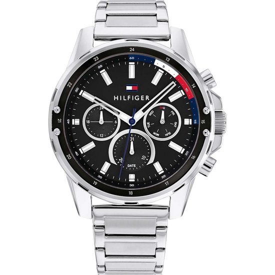 Zilverkleurig Tommy Hilfiger herenhorloge met zwarte wijzerplaat en datumweergave.