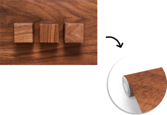 Cubes en bois sur un fond en bois fotobehang