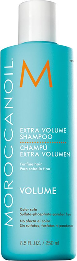 Turquoise fles met oranje 'M' logo. Extra Volume Shampoo voor fijn haar.