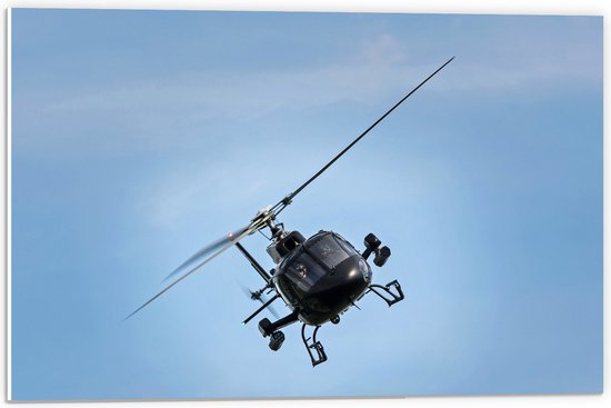 WallClassics - PVC Schuimplaat - Zwarte Helikopter bij Blauwe Lucht - 60x40 cm Foto op PVC Schuimplaat (Met Ophangsysteem)
