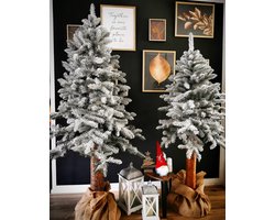 Kunstkerstboom op houten stam 180cm besneeuwd
