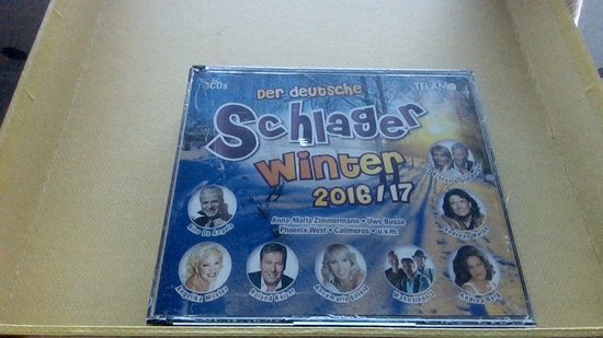 CD-box Der deutsche Schlager Winter 2016/17 met winterlandschap en foto's van diverse Duitstalige artiesten.