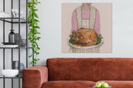 Une femme avec une dinde pour le dîner de Thanksgiving toile 90x90 cm - Tirage photo sur toile (Décoration murale salon / chambre)