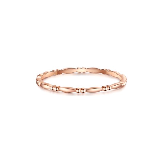 Fine bague en or rose avec des perles et des ovales alternés.