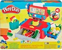 Play-Doh kassa verpakking met rode en blauwe kassa, speelgoedeten, vier potjes Play-Doh en een Minion.