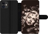 Bookcase Geschikt voor iPhone 12 Pro Max telefoonhoesje - Vrouw - Bloemen - Vlinder - Met vakjes - Wallet case met magneetsluiting